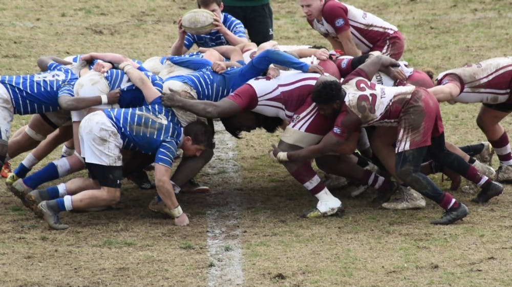 <p>The Memphis Tigers enters a scrum with the Mississippi State Bulldogs in last year's game. This year the Tigers beat the Bulldogs 31-19 in Starkville.</p>