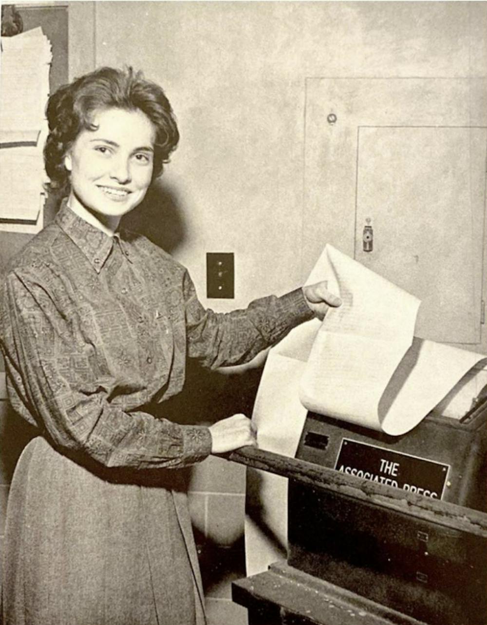 <p><span>Elinor Grusin at an AP wire machine outside The Tiger Rag in 1962. After graduating, Grusin dedicated her life to journalism, writing for The Commercial Appeal and teaching journalism at Ole Miss, Ohio University, and the University of Memphis.&nbsp;</span></p>