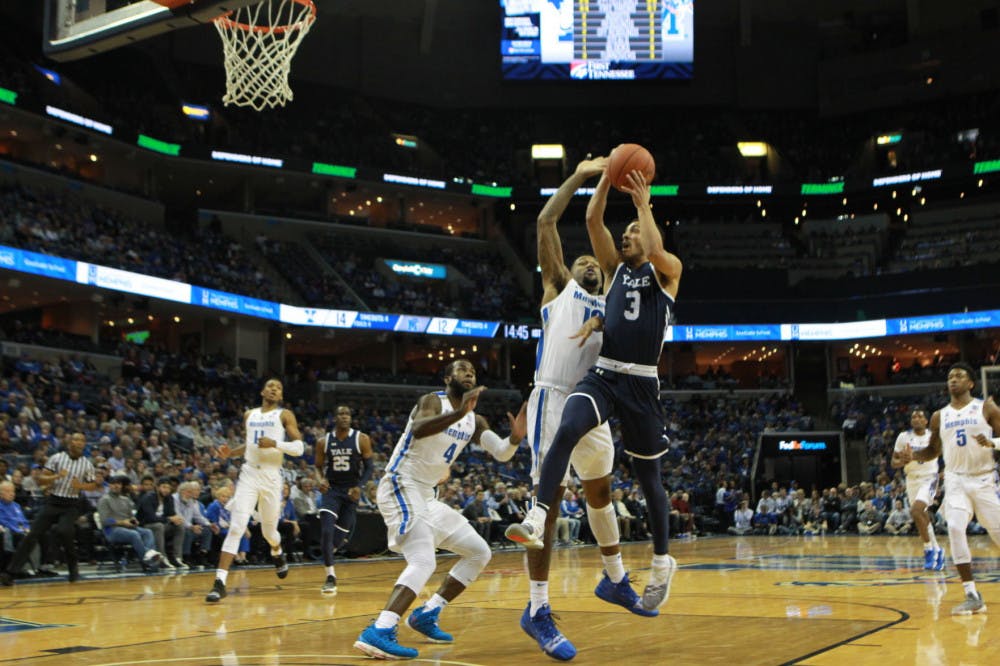 <p class="p1"><span class="s1"><strong>Forward Mike Parks Jr. defends the rim as a Yale player goes up for a layup. Coach Penny Hardaway has his team playing with heart and poise.<span class="Apple-converted-space">&nbsp;</span></strong></span></p>