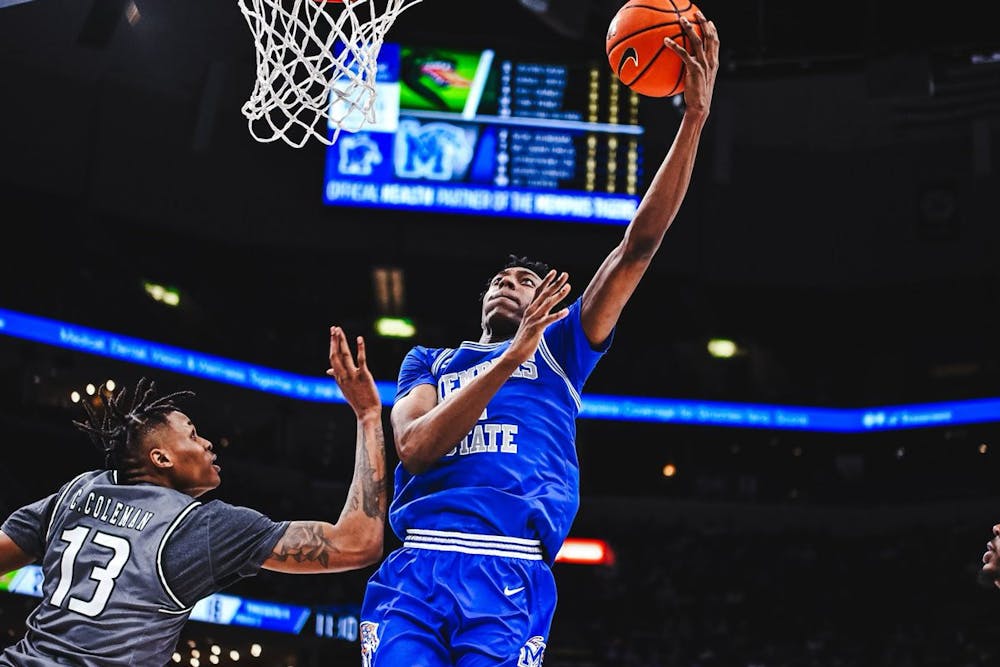 Nae'Qwan Tomlin hits a layup in Memphis' senior day victory over UAB.