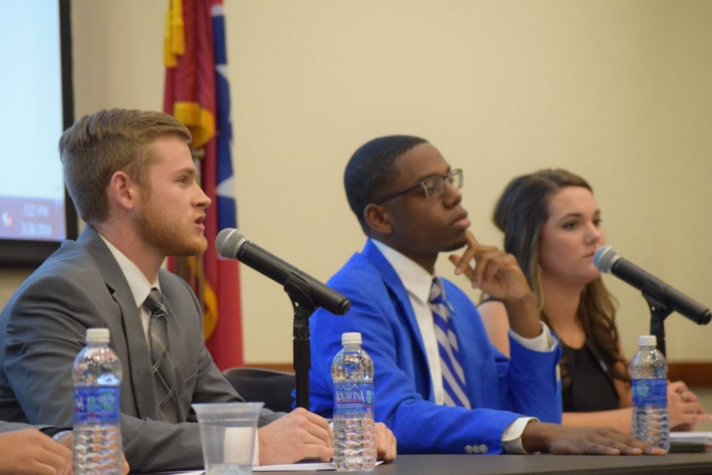 <p class="p1">People’s Party candidate Nicolas D’Alto (left) participated in a debate Monday night against Refresh Party candidate Jared Moses (middle) for the upcoming student government elections. Both candidates decided to run a more civil debate than last year’s heated</p>
<p class="p1">election.</p>
