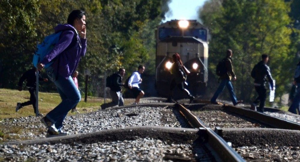 <p>As students headed to the parking lot near Southern Avenue, their leisurely walk quickly turned into a mad sprint when the echo of a locomotive horn boomed across the University of Memphis main campus. (Photo by <a href="https://twitter.com/JonathanCapriel">Jonathan A Capriel</a>)</p>