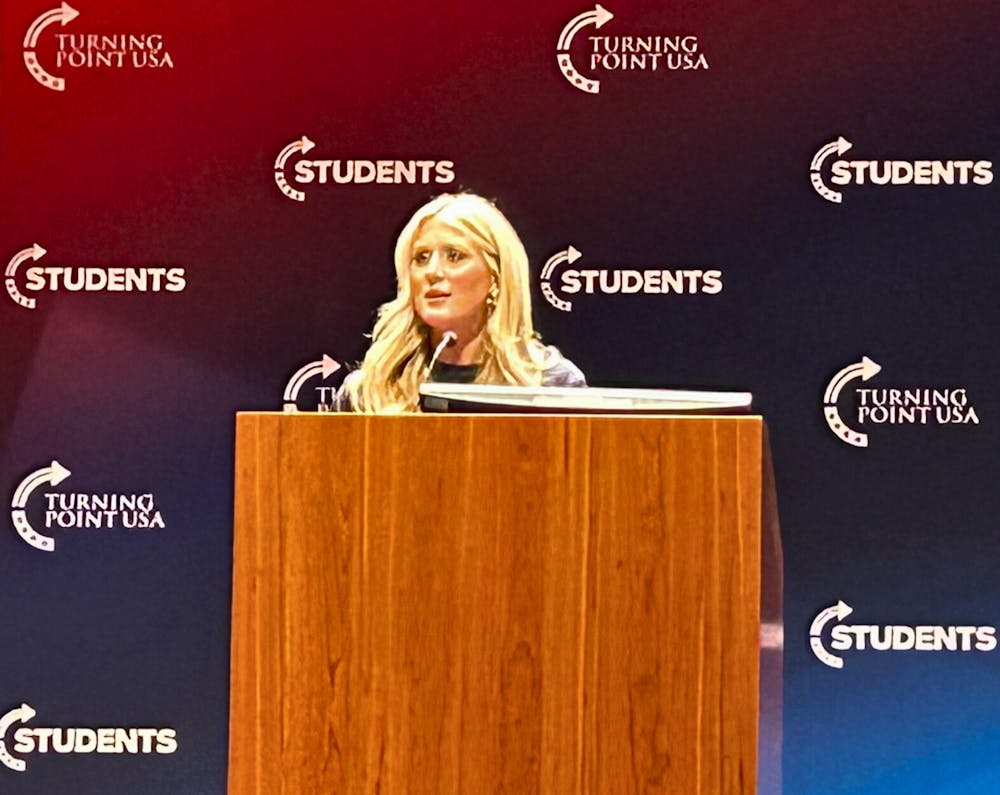Riley Gaines speaking at the TPUSA event on Wednesday night.