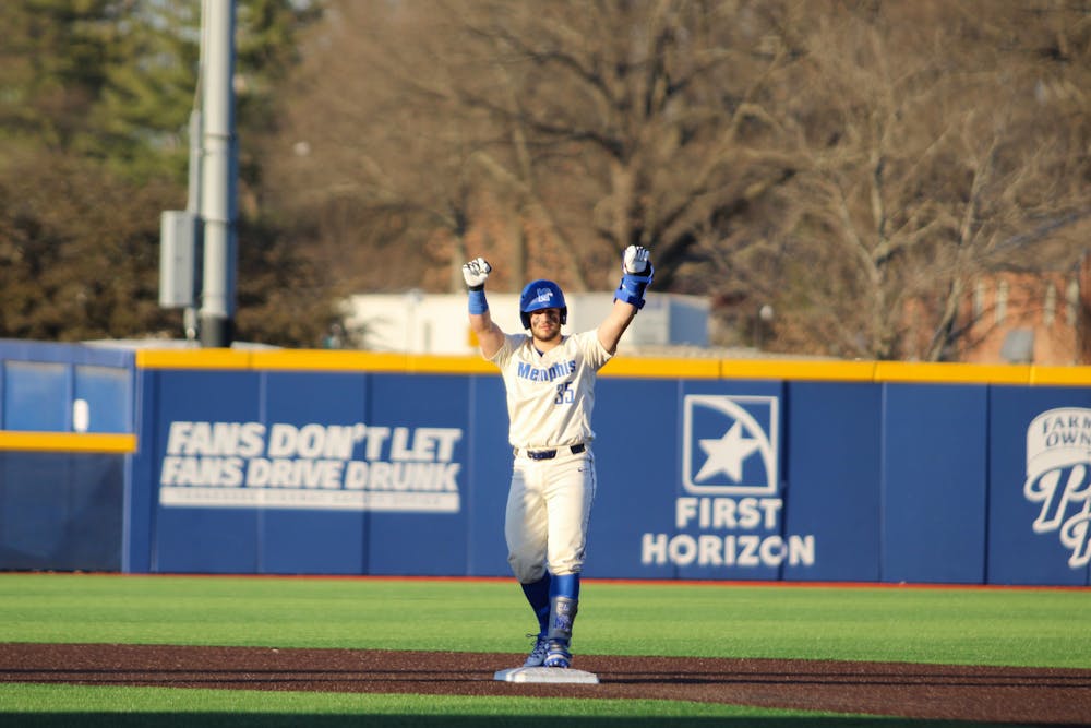 Memphis catcher Jonah Sutton celebrates at second base after a double in the Tigers' victory over Alabama A&M.