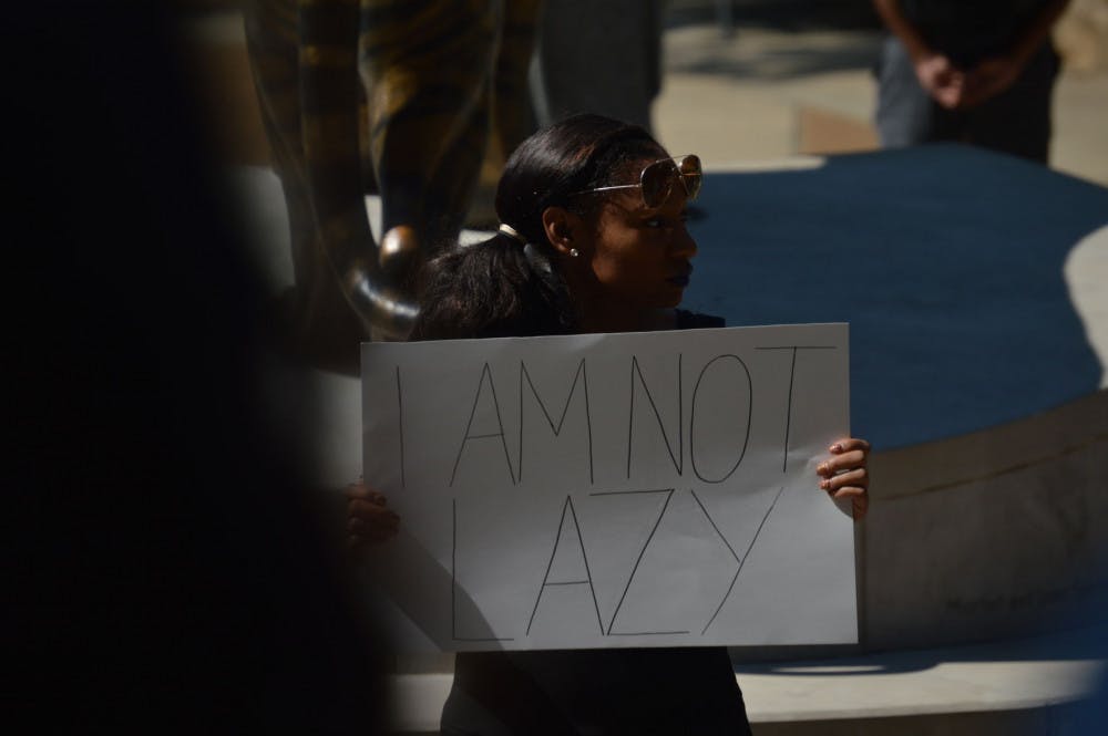 Students protest racism in front of the University Center