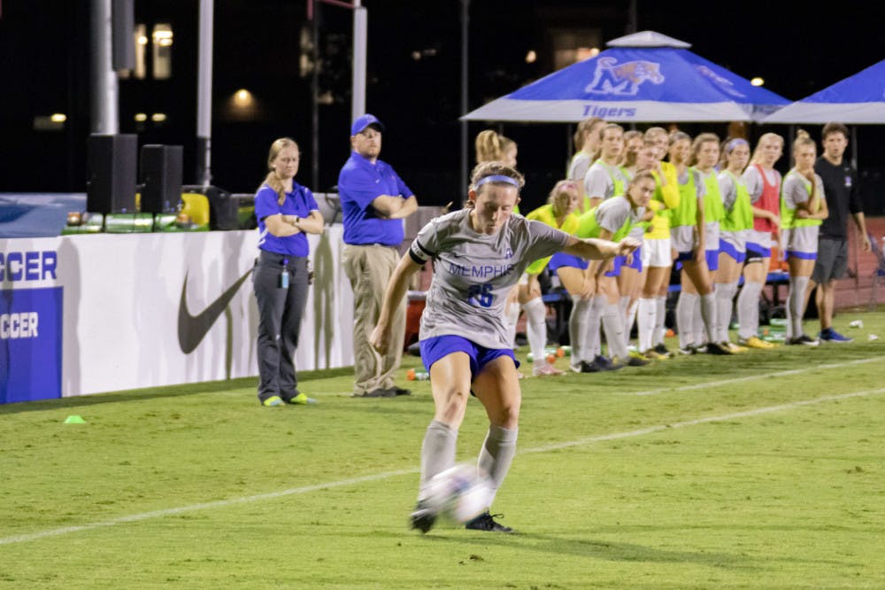 <p>Stasia Mallin goes for a long cross into the opponent's territory. Mallin tallied the lone goal in a 2-1 loss against Kansas last Friday.</p>