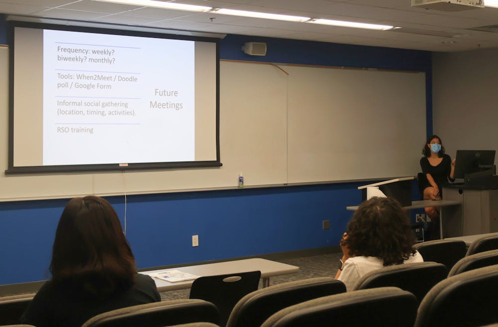 <p>A member of the Interdisciplinary Criminal Justice Coalition speaks during the group’s first meeting of the semester at the Fogleman College of Business.</p>