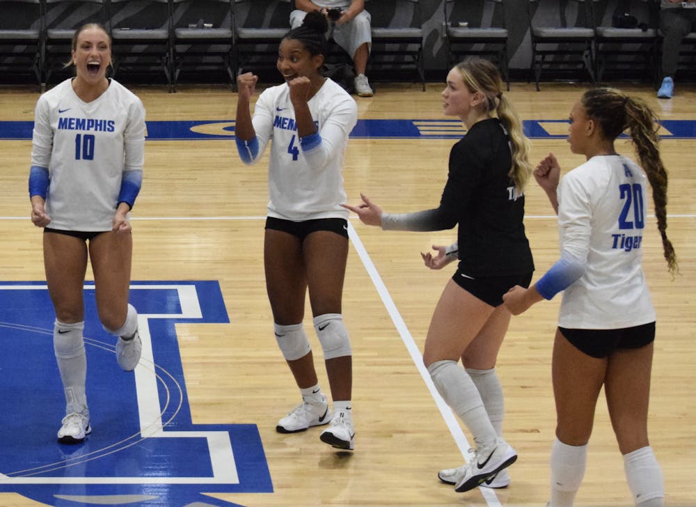 <p>Memphis Volleyball celebrates a point in their victory against Chattanooga at Elma Roane Fieldhouse on September 11.﻿</p>