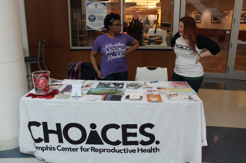 <p>Volunteer workers Mary Vandy and Miesha Devres are in the University Center at The University of Memphis promoting Choices, Memphis Center for Reproductive Health. The ladies are there to sign up volunteers for Choices and to inform students about free HIV testing through the month of March.</p>