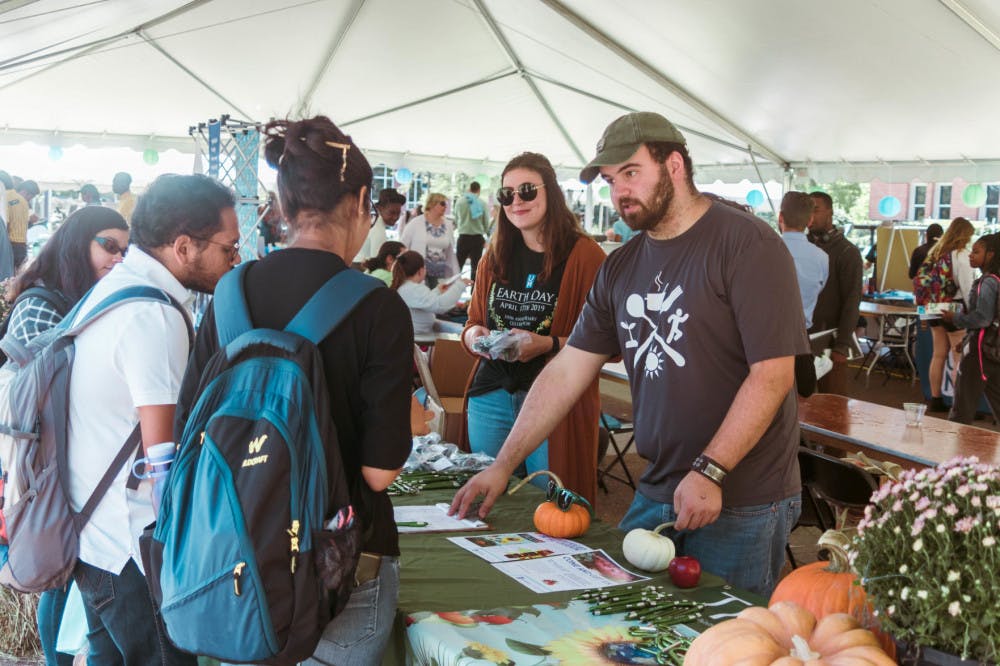 <p class="p1"><span class="s1">Students learn from participants about the Tiger Garden, which has various plants that are available for students to harvest. The garden will host a sweet potato pull as well as music events in October.</span></p>