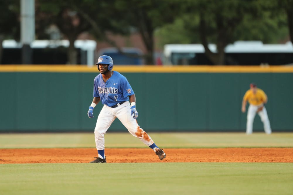 <p>Outfielder Carlos Williams gets ready to steal third base. The Covington native is one of only five seniors on the 2018 Tigers roster.</p>