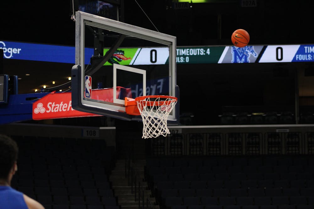 Lone returner Nick Jourdain warms up before Memphis' game against UAB last season.