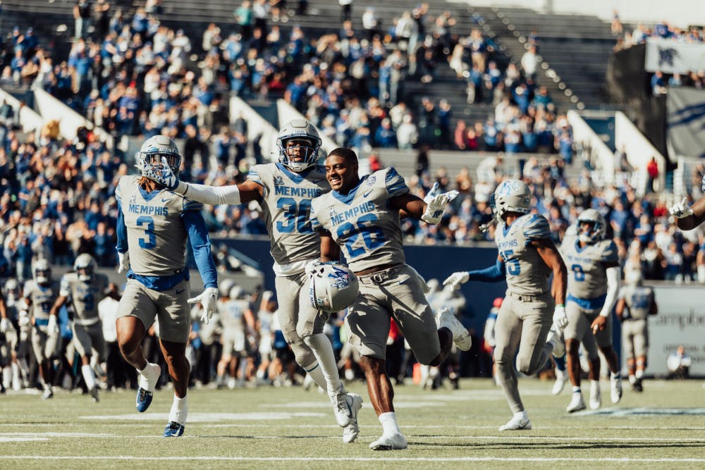 <p>The Tiger defense celebrates after Rodney Owens' game-sealing interception against SMU Saturday morning.&nbsp;</p>