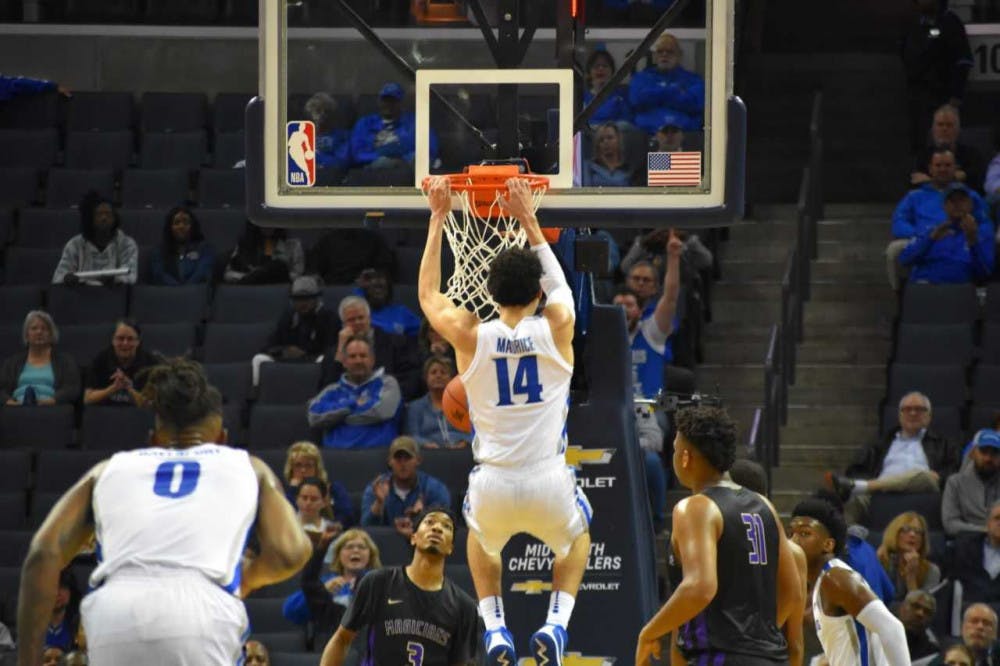 <p>Isaiah Maurice dunks the ball. Maurice had 18 points and shot 70 percent from the field.&nbsp;</p>