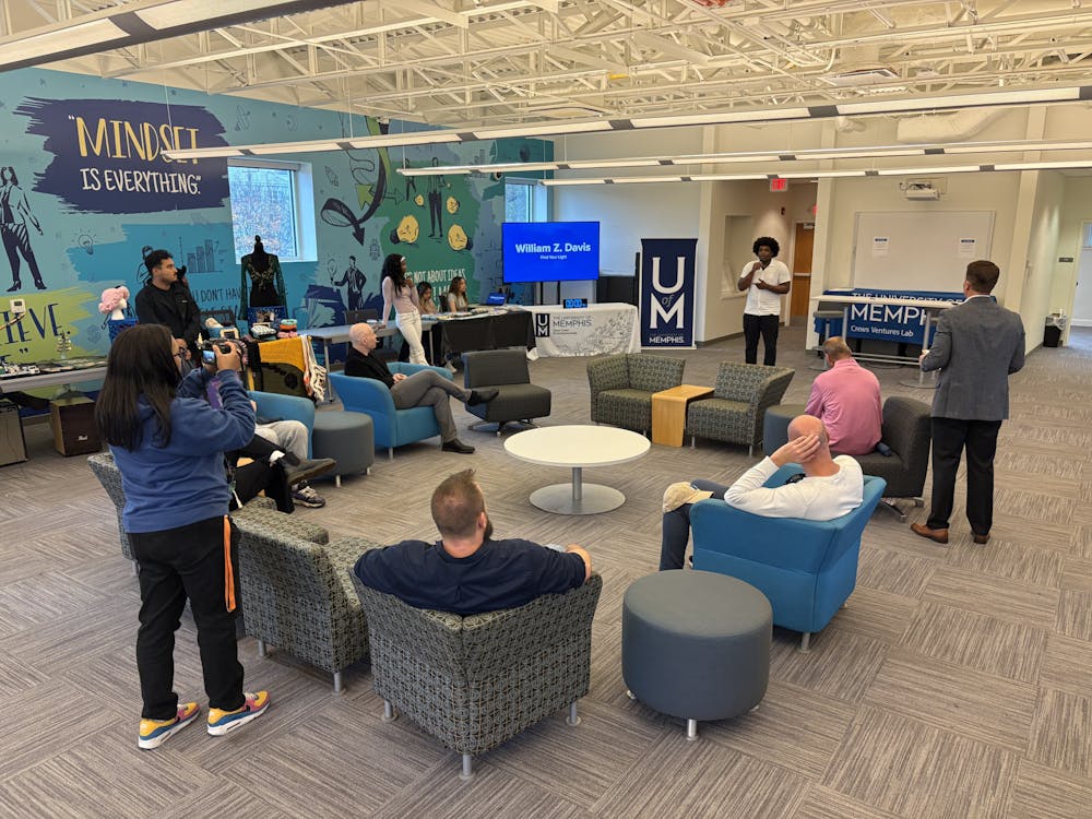 <p>A student presents their elevator pitch to judges and attendees during the Made by Tigers Expo at the Crews Center for Entrepreneurship on Friday afternoon.</p>