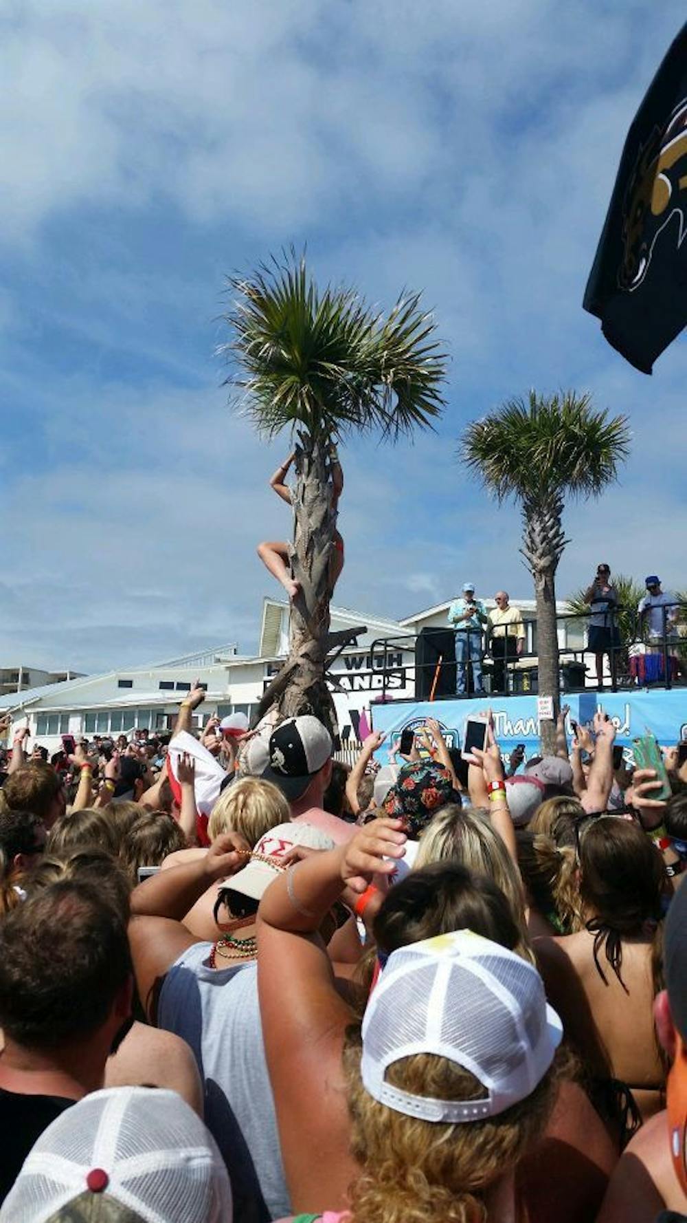 <p class="p1">Spring breakers crowd around a Luke Bryan concert for his last annual show at Spinnaker Beach Club in Panama City Beach last spring.</p>