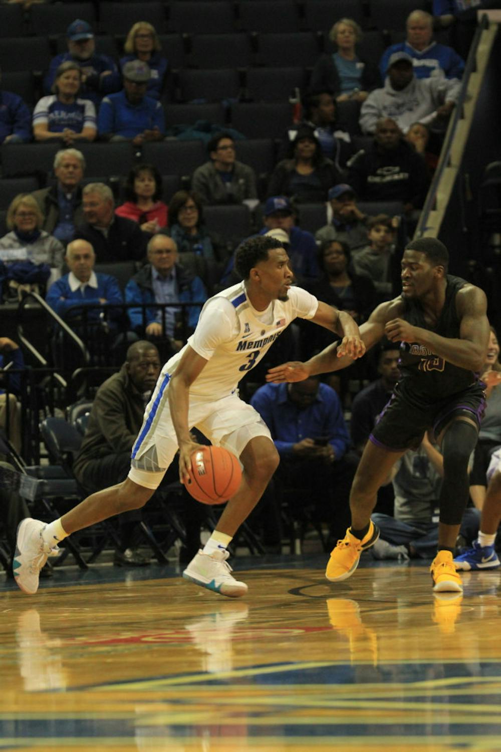<p>Jeremiah Martin drives against a defender. Martin finished with 11 points shooting 3-9 from the field.&nbsp;</p>