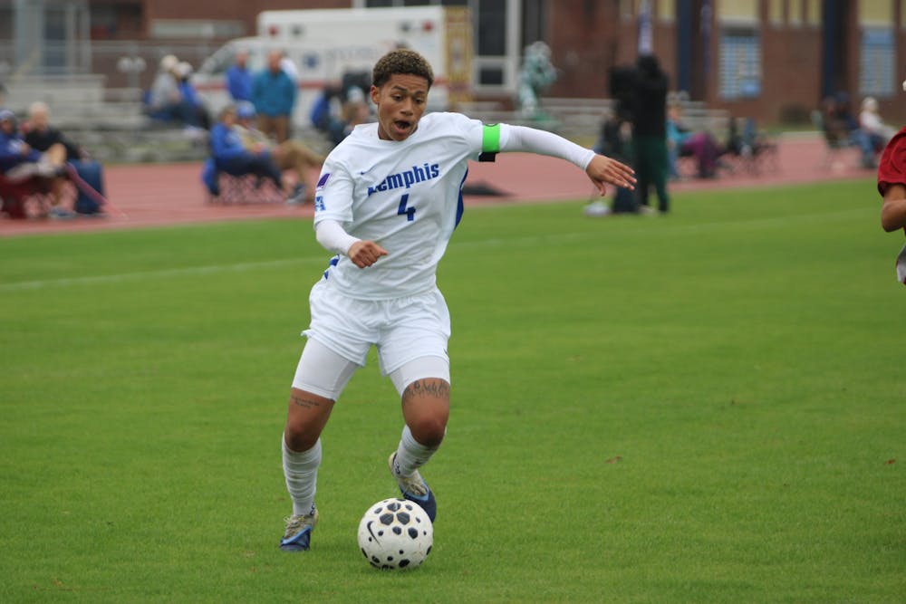 Memphis striker Ashley Henderson dribbles towards the Temple box in the Tigers' 6-0 victory over Temple Monday afternoon at the Track and Soccer Complex on Park Avenue Campus.