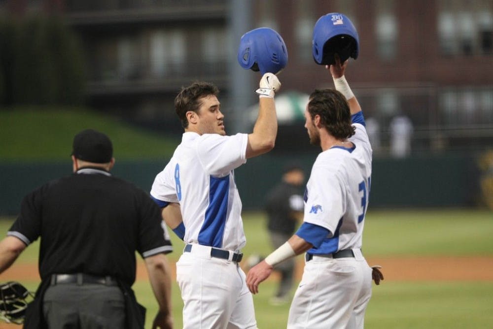 <p>Memphis Tiger senior first baseman Tucker Tubbs celebrates with senior outfielder/infielder Kane Barrow during Tuesday’s victory over Mississippi State. Photo by David Minkin</p>