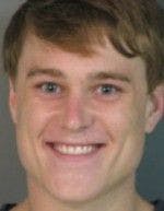 Student hits officer with car, tries to speed away