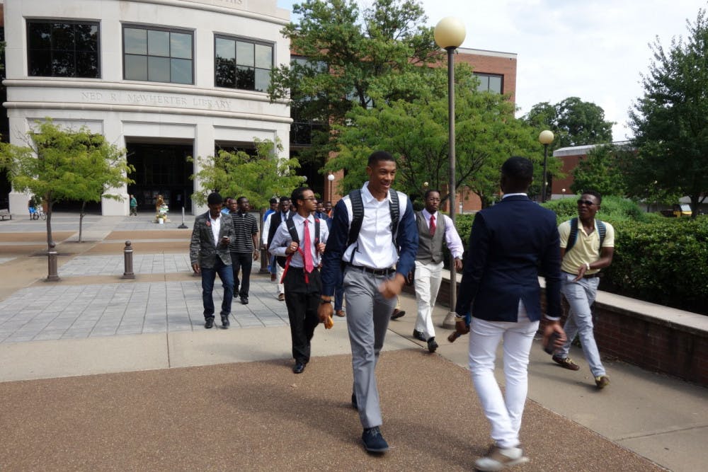 <p>E.M.O.C. President Fredrick Jones leads his members on their empowerment walk from the McWherter Library &nbsp;to the University Center.&nbsp;</p>