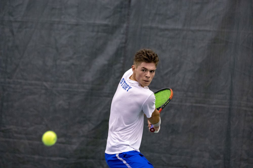 <p class="p1"><span class="s1"><strong>Matt Story focuses on the ball during a lengthy rally in his singles match against LSU. Story almost made a comeback in his match after hurting his hand, but fell short in three sets, 1-6, 7-5, 3-6.</strong></span></p>