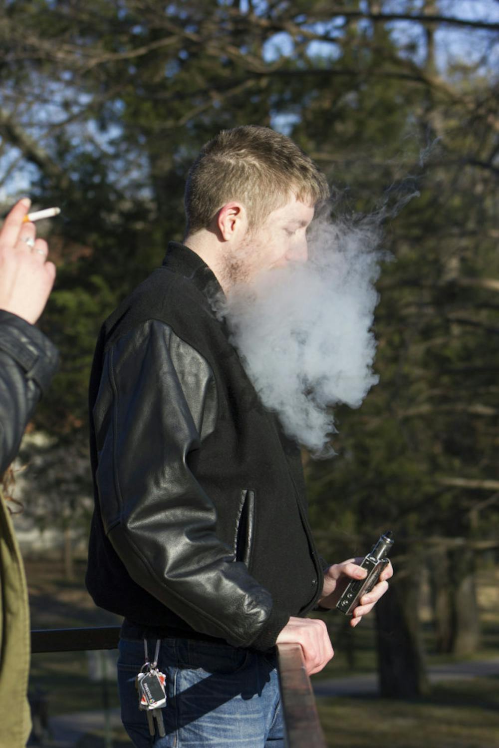 <p class="p1">Casey Speraw, computer science student, blows smoke from</p>
<p class="p1">his vaporizer near Patterson Hall on Feb. 9, 2016. In a recent</p>
<p class="p1">email to all students, the U of M alluded to cracking down on</p>
<p class="p1">smoking outside of designated areas.</p>