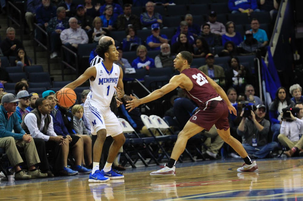 <p class="p1"><span class="s1">Jamal Johnson (left) looks for an open teammate from the wing. The freshman is second on the team with eight made threes.</span></p>