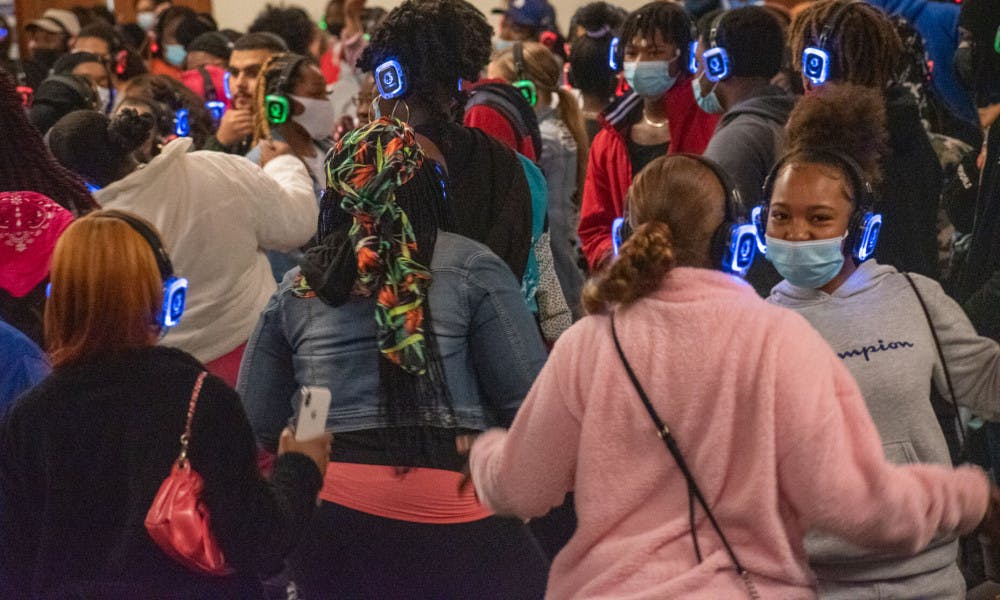 <p>A group of students dancing at Tuesday's silent disco. Many students showed up to the unique event which the university has been putting on for several years.</p>