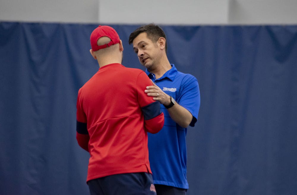 <p>Hayden Perez has some words with an Ole Miss coach after their match in Oxford, Miss. on Jan. 20, 2020. Perez's team stands with an 1-2 record with both loses coming from SEC schools.&nbsp;</p>