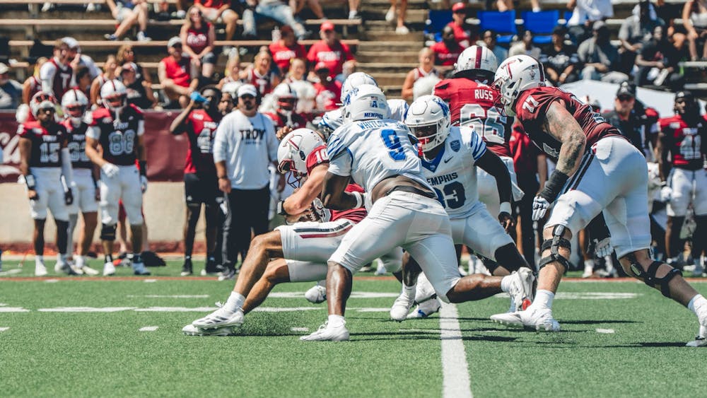 Memphis lineman William Whitlow Jr. sacks Troy's quarterback in the Tigers' 28-7 win at Troy Saturday.