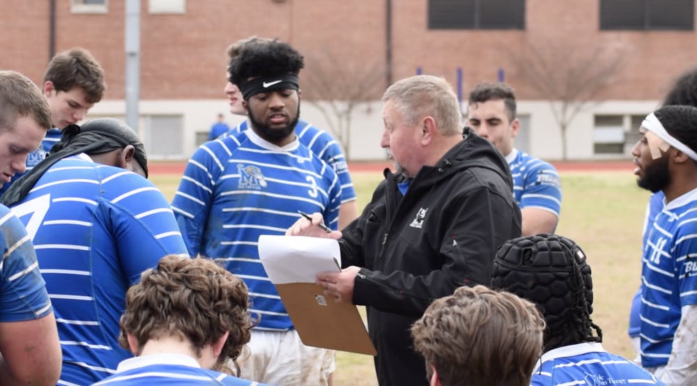 <p class="p1"><span class="s1"><strong>Head coach Steve Swatzyna speaks to the University of Memphis Rugby Team during halftime. The Tigers won their last two games.</strong></span></p>