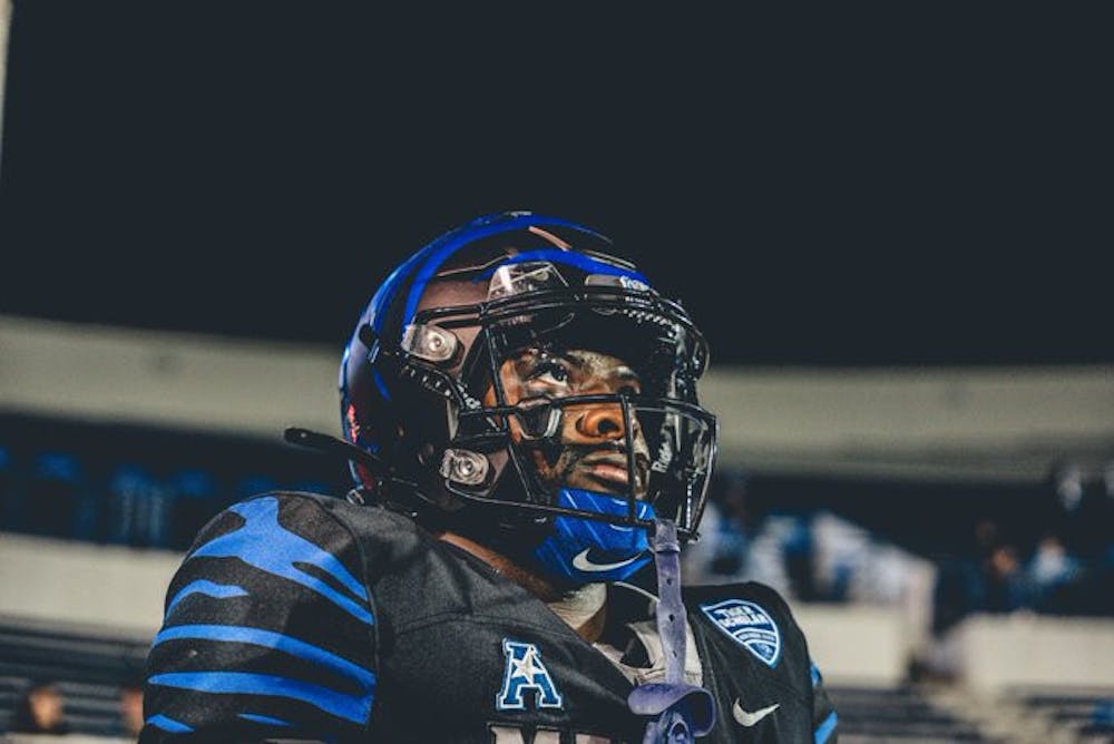 Memphis running back Mario Anderson Jr. looks into the crowd in the Tigers' Friday night face-off against Rice.