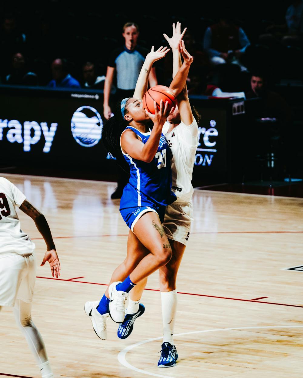 <p>Alasia Smith drives to the hoop in Memphis&#x27; game against Temple. She finished with 16 points in the loss.</p>