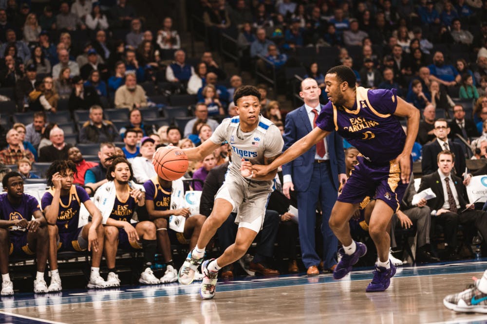 <p>Boogie Ellis drives to the lane against the East Carolina Pirates. Ellis ended the contest with 17 points and three rebounds.&nbsp;</p>
