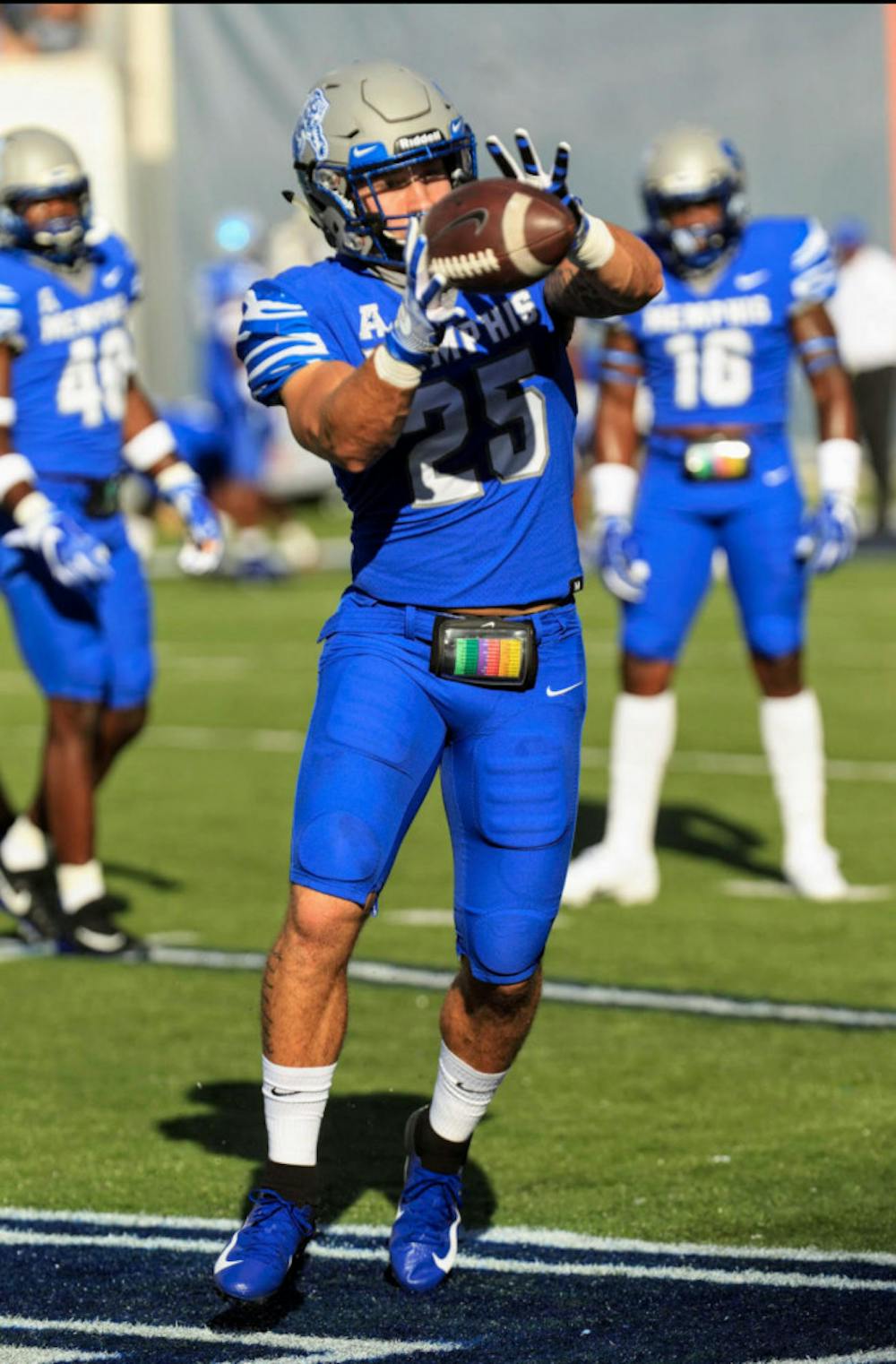 <p>Austin Hall catching the ball while practicing. Hall spoke exclusively with The Daily Helmsman about this week's battle against the Navy.</p>