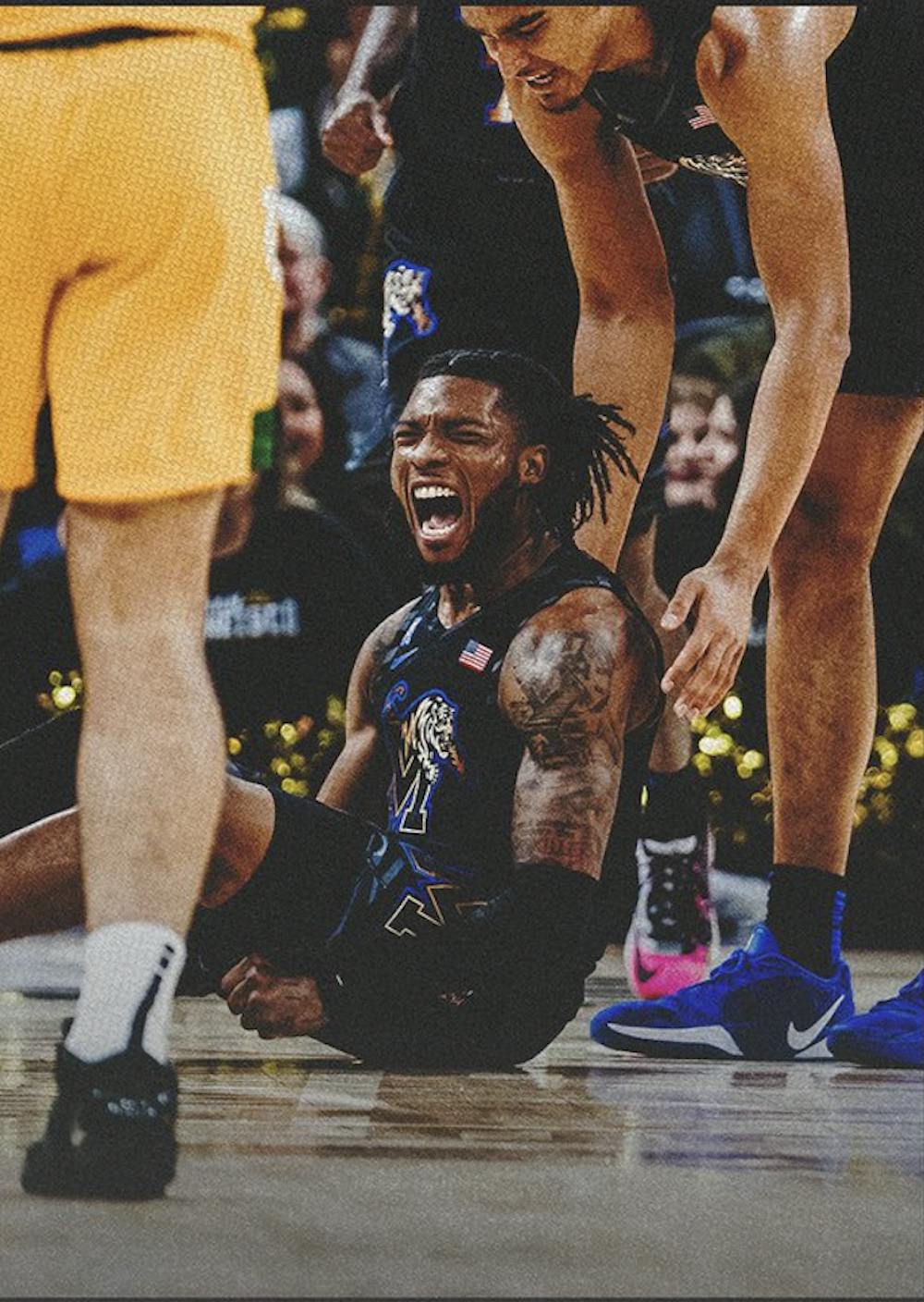 Tyrese Hunter celebrates forcing an offensive foul in Memphis' win over San Francisco.