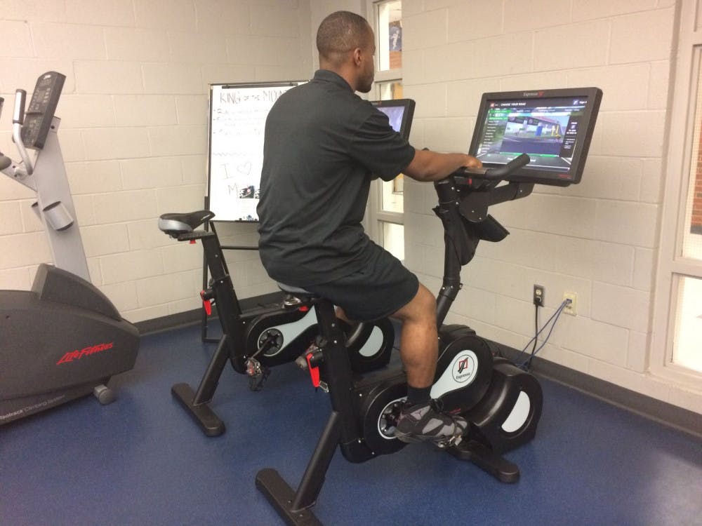 <p>University of Memphis team captain Eric Pugh rides one of the Expresso Bike Challenge bikes at the Recreation Center. Pugh and his team are gearing up for Fall Frenzy, which begins in October.</p>