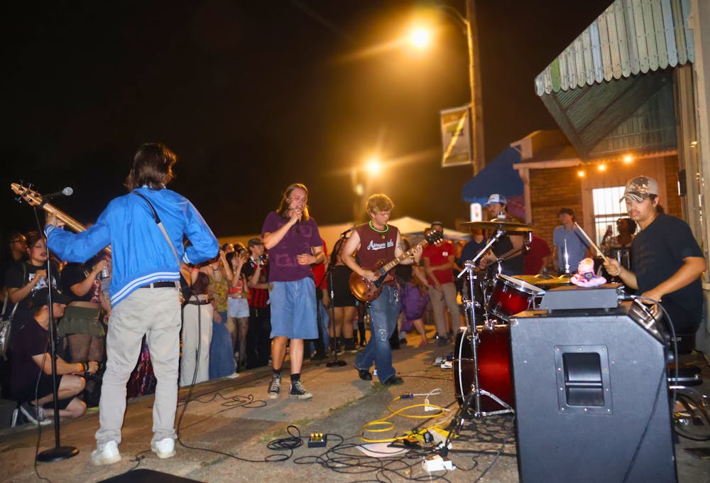 Lead vocalist Liam Wilde, Lead guitarist James Alberts, Rhythm guitarist Bridger Whittier, Bassist Brandon Kelly, and Drummer Marshall Rambin perform in front of a local crowd at the Java Cabana Coffeehouse on Friday night.