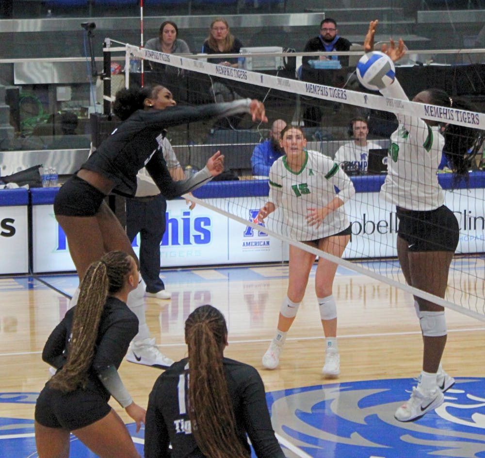 <p>Memphis&#x27; Brianna Washington attempts a spike in the Tigers&#x27; loss against North Texas on senior day on October 19 at Elma Roane Fieldhouse.﻿</p>