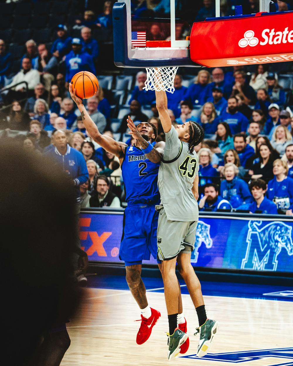 <p>Memphis wing Zach Davis hypes up the crowd in the Tigers&#x27; 78-71 victory over Baylor at FedExForum on Dec. 6. Davis scored a career high 23 points to lead Memphis.<br/></p>