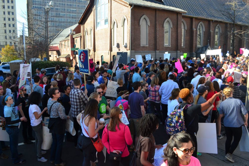 <p>Protesters gather in downtown Memphis to advocate for women's rights. The marchers joined a nationwide protest Jan. 21.</p>