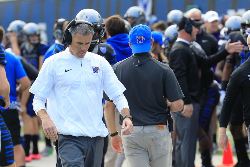 <p class="p1"><span class="s1">Head coach Mike Norvell walks the sideline before the game. Norvell signed a five-year contract extension with the Tigers Dec. 5.&nbsp;</span></p>