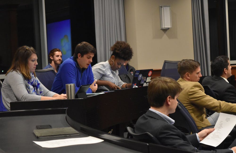 <p><strong>Drew Gilmore, Student Government Association president, addresses the SGA body during their meeting Thursday. Gilmore sent a letter to Sen. Lamar Alexander urging him to support the Federal Perkins Loan Extension Act.</strong></p>