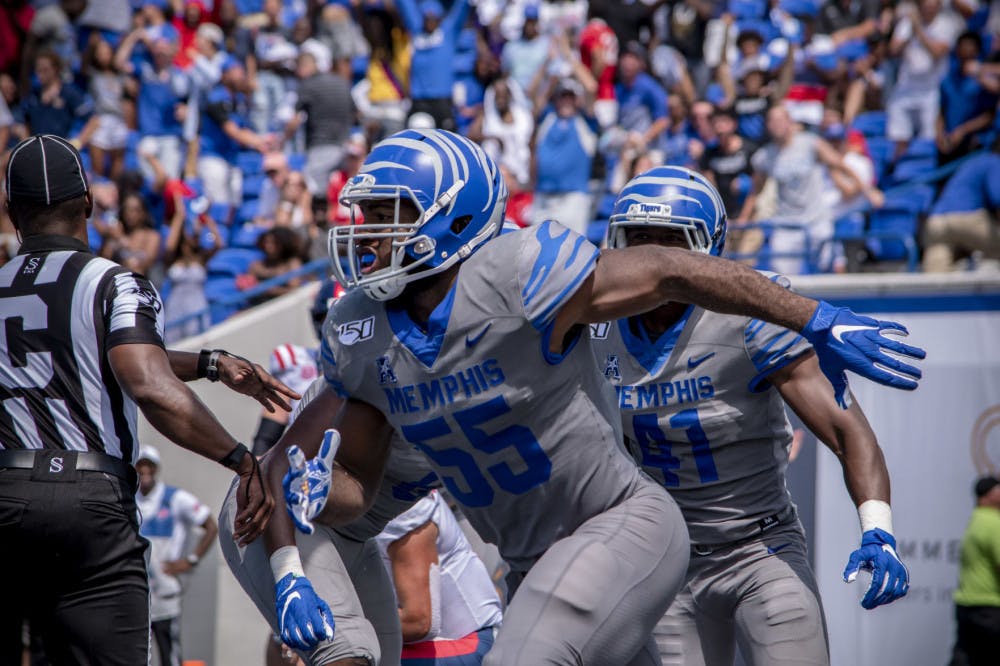 <p>Bryce Huff celebrates a safety that stifled the Ole Miss Rebels late in the game. The Memphis Tigers defeated their regional rivals 15-10 at the Liberty Bowl Memorial Stadium.</p>
