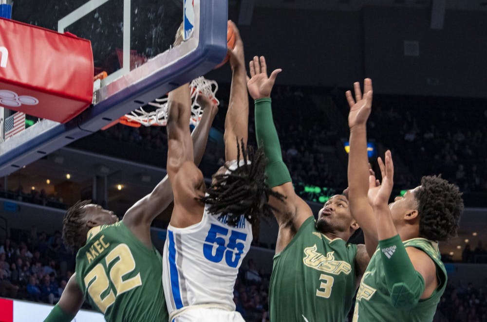 <p>Precious Achiuwa with a strong dunk on multiple USF players. Achiuwa ended the game with six points and three rebounds after leaving the game early due to injury.&nbsp;</p>