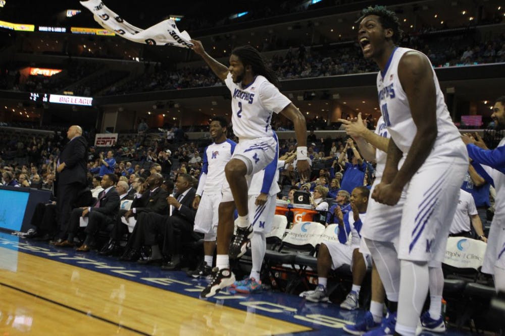 <p>The Tigers' players celebrate on the bench during the win against UCF. Memphis (15-11, 6-7 AAC), for the third time this season, avoided its first three-game losing streak under coach Josh Pastner.&nbsp;</p>