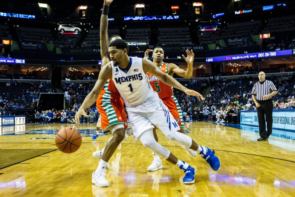 <p>Dedric Lawson drives to the hoop for the score. The Tigers will play Milwaukee on Wednesday night.</p>