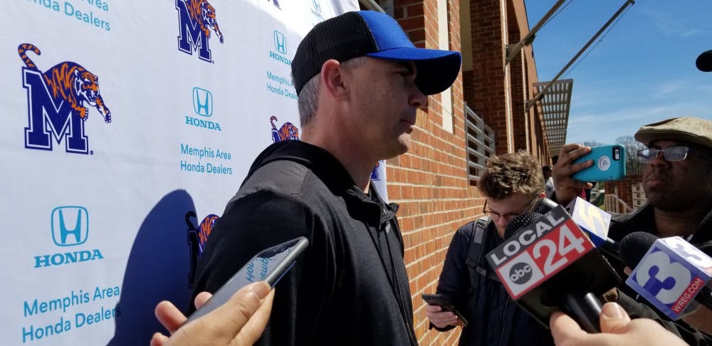 <p class="p1"><span class="s1"><strong>Memphis football head coach Mike Norvell talks with reporters following practice. Memphis kicked off spring training Saturday.</strong></span></p>