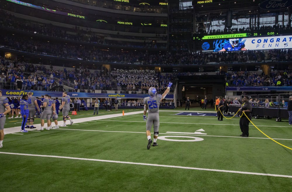 <p>Austin Hall takes a moment after the Cotton Bowl to thank the fans for their support. The Memphis Tigers lost 53-39 against the Penn State Nittany Lions in Ryan Silverfield's head coaching debut.&nbsp;</p>
